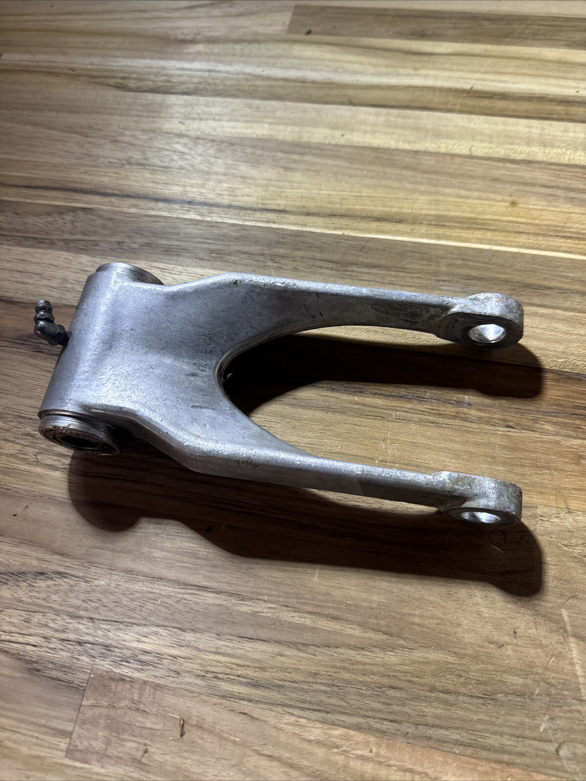 Genuine 1989-1998 Suzuki RMX 250 Swing Arm Linkage Link OEM 62600-27850