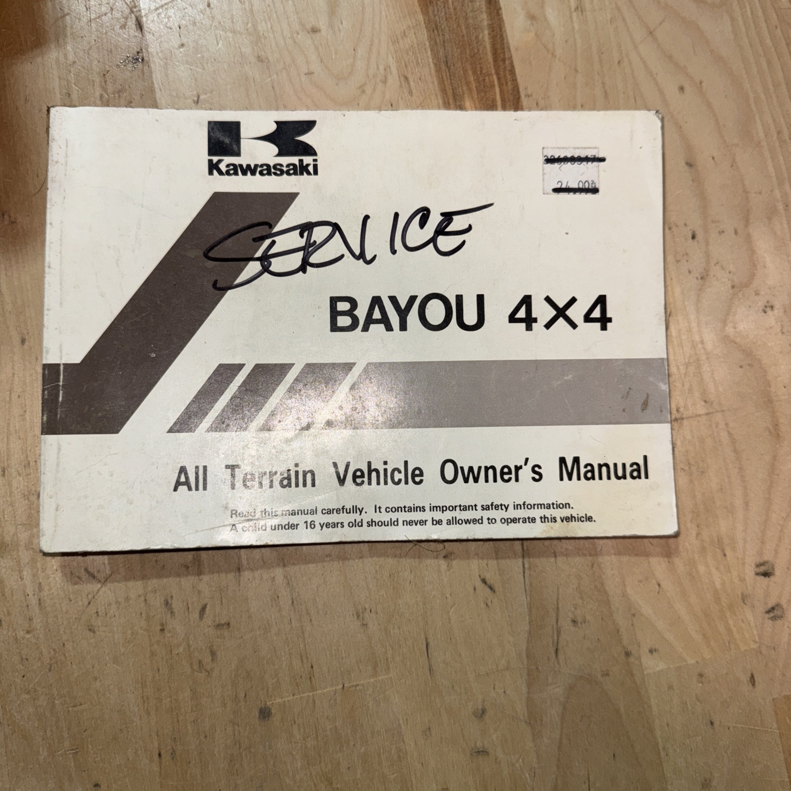 ORIGINAL KAWASAKI BAYOU 4X4 ATV OWNER'S MANUAL, PART #99920-1700-01